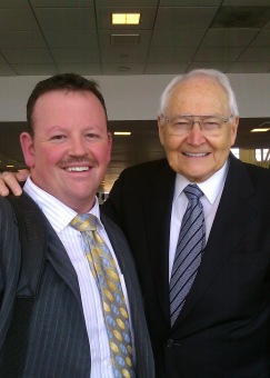 Carl with LDS Apostle L. Tom Perry; 2011 at Dulles Airport